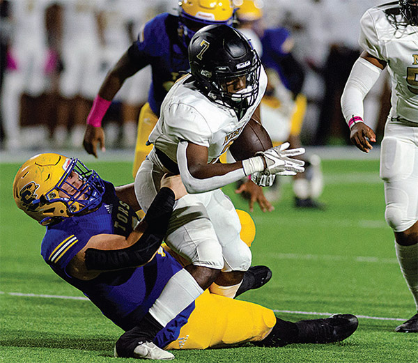 Tors score twice in fourth quarter to beat New Iberia American Press