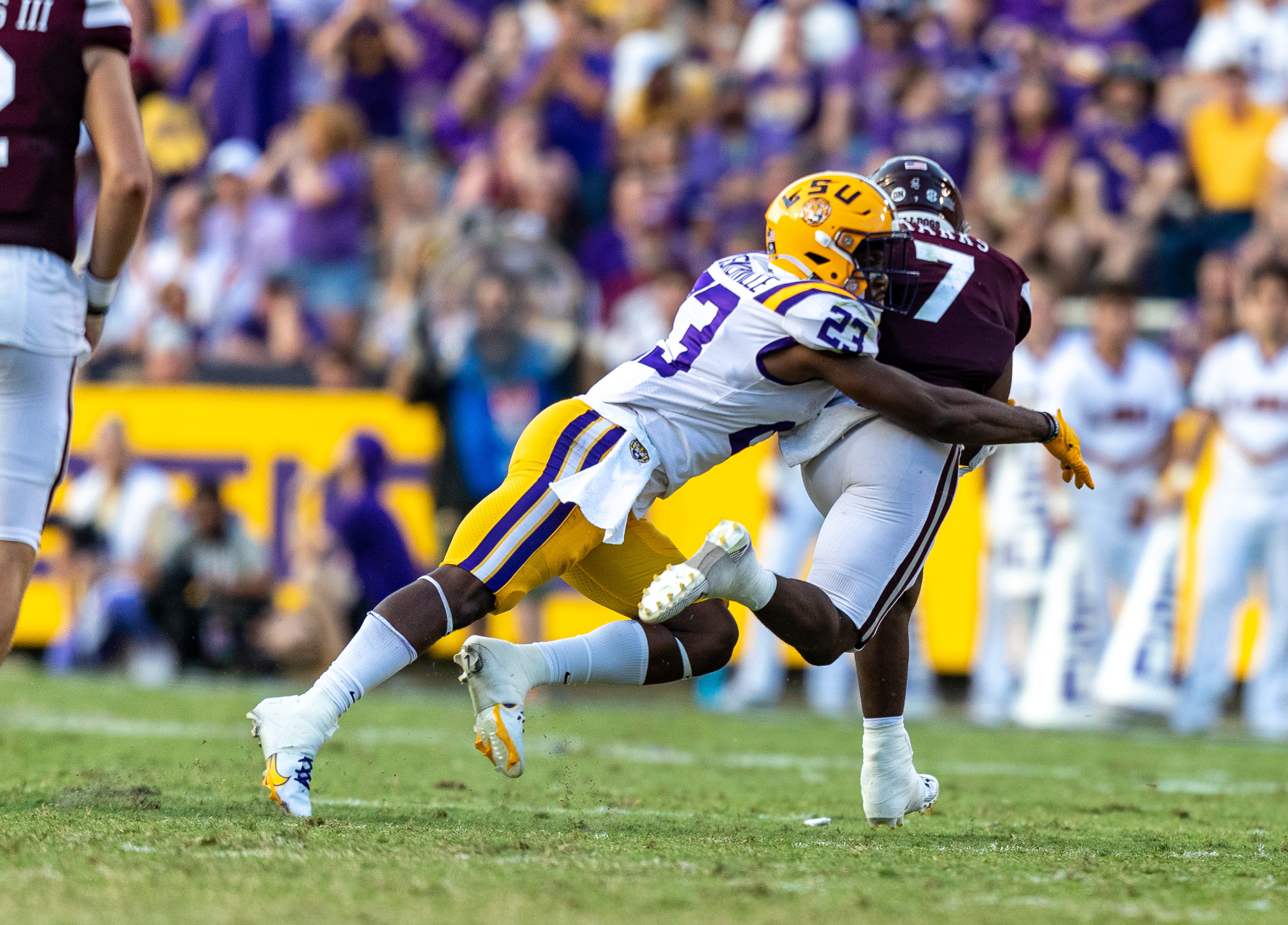 Micah Baskerville makes a tackle on a Mississippi State wideout 